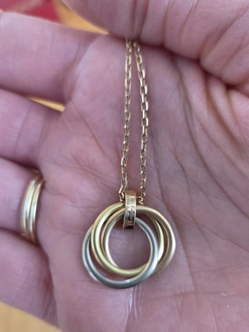 Trinity necklace by Cartier